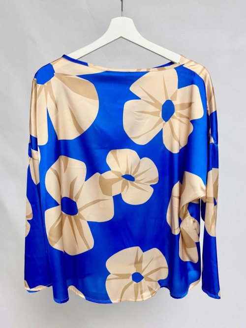 Oversized satin blue blouse with beige floral print