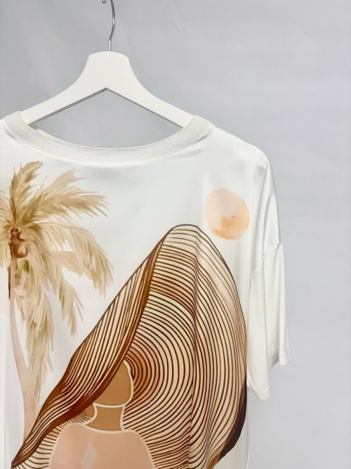 Oversized satin blouse with exotic art print