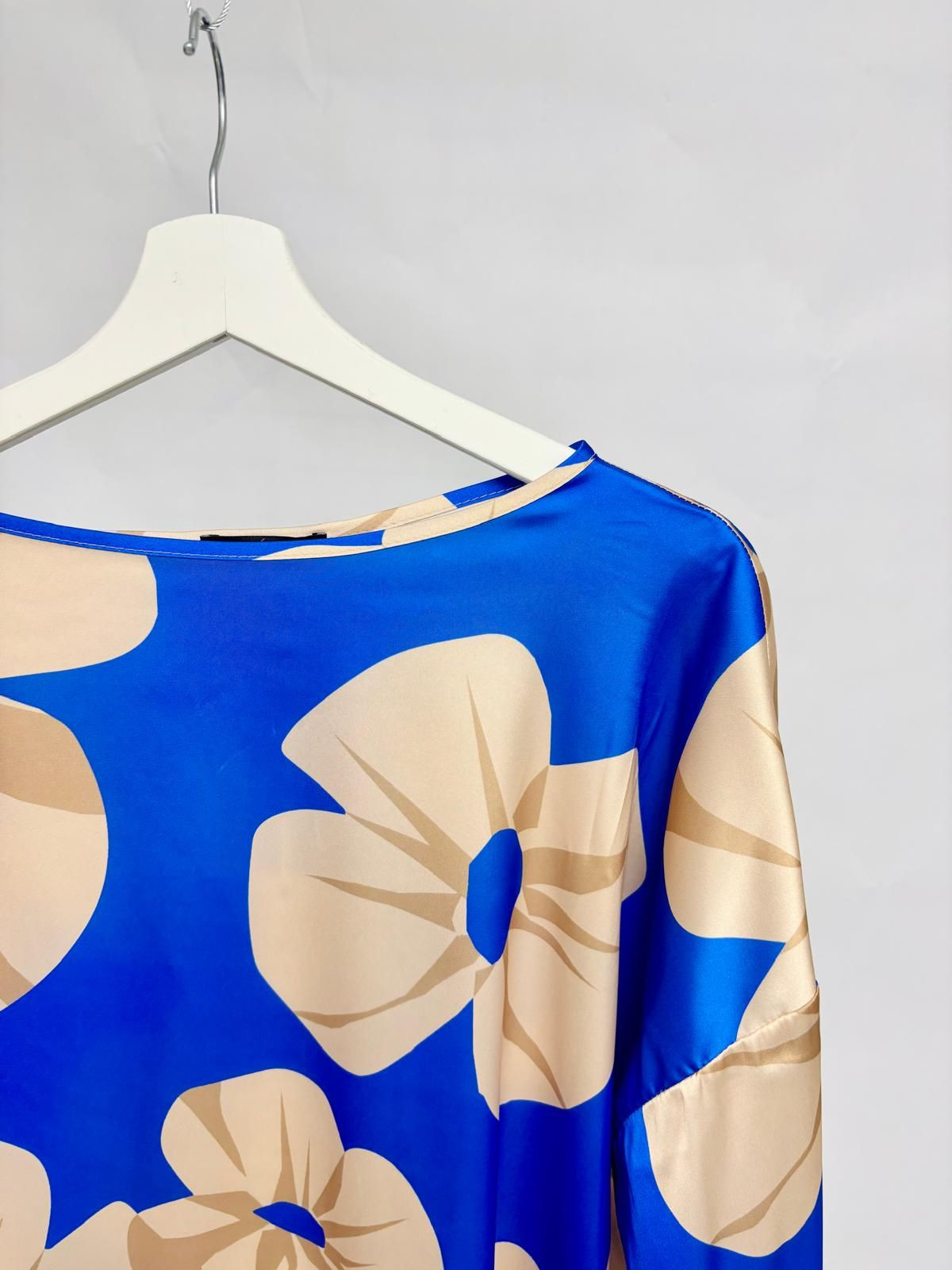 Oversized satin blue blouse with beige floral print